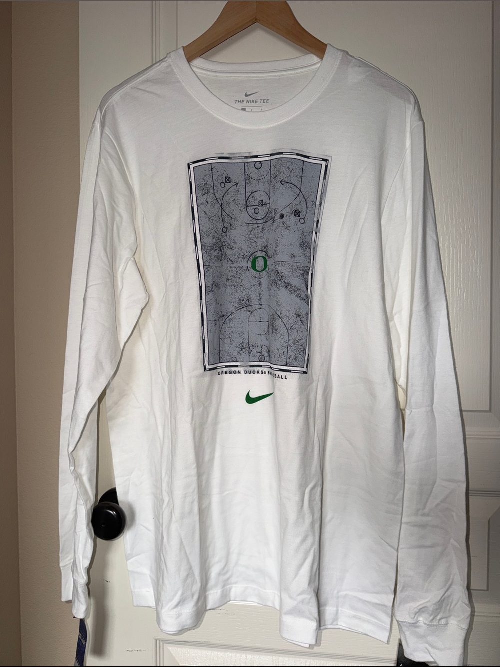 Nike White Long-Sleeve Basketball Graphic Tee with Green Accents